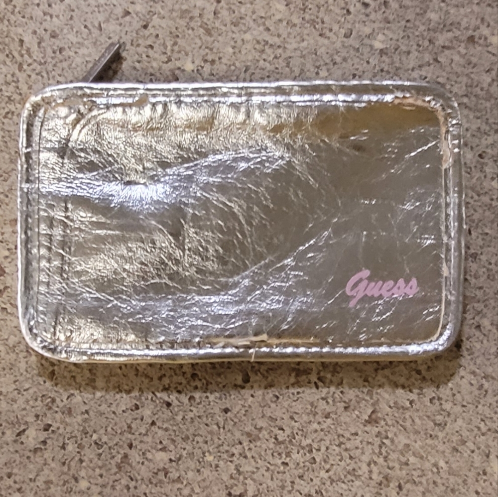 Metallic guess clutch
